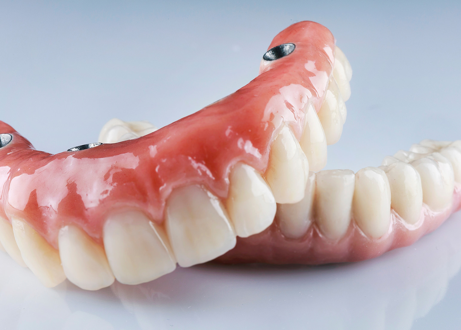 Proper care and maintenance of implant-supported overdentures for long-lasting oral health